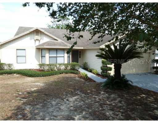 Exterior Front - Freshly painted with wonderful mature landscaping