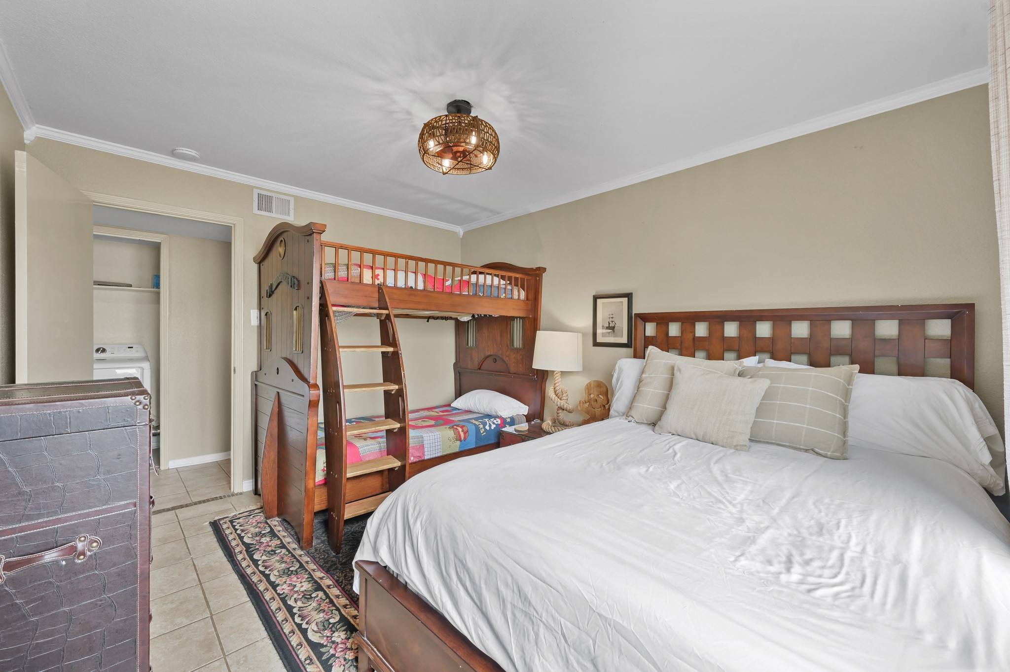 116 April Point Drive North Conroe, TX 77356 - Photo 11 of 44 a bedroom with a bed and wooden floor