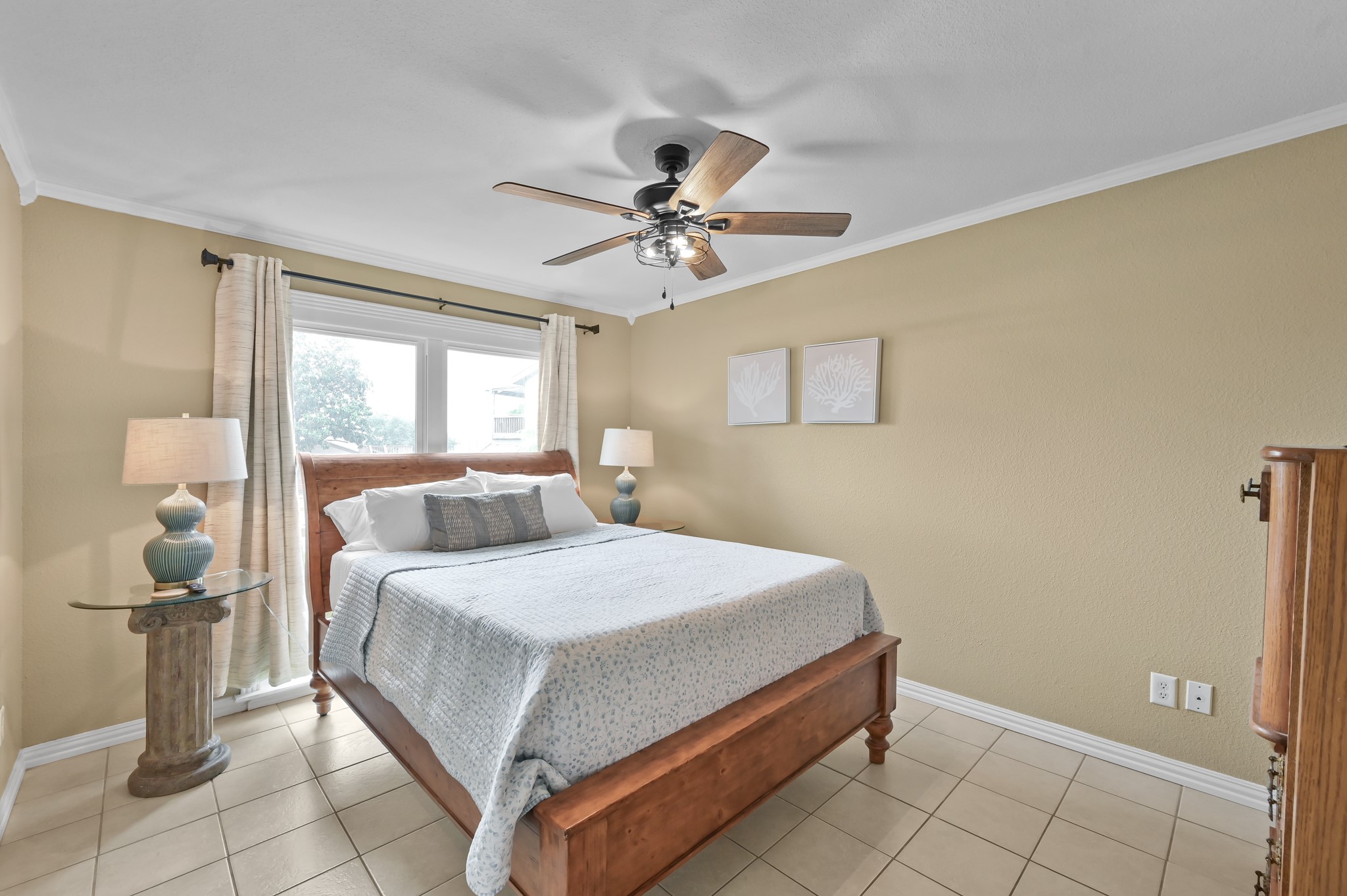 116 April Point Drive North Conroe, TX 77356 - Photo 12 of 44 a bedroom with a bed and window