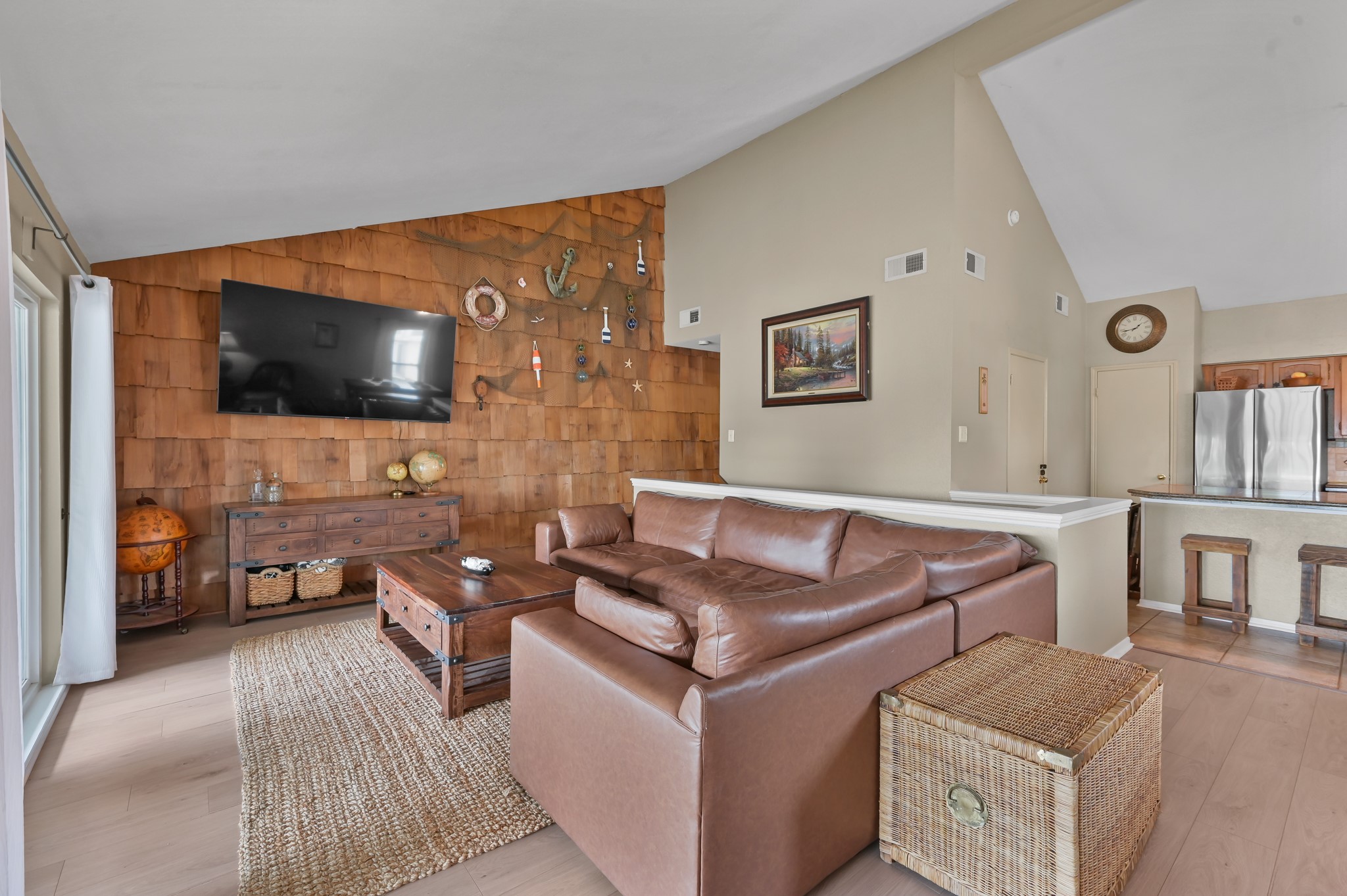 116 April Point Drive North Conroe, TX 77356 - Photo 19 of 44 a living room with furniture and a flat screen tv