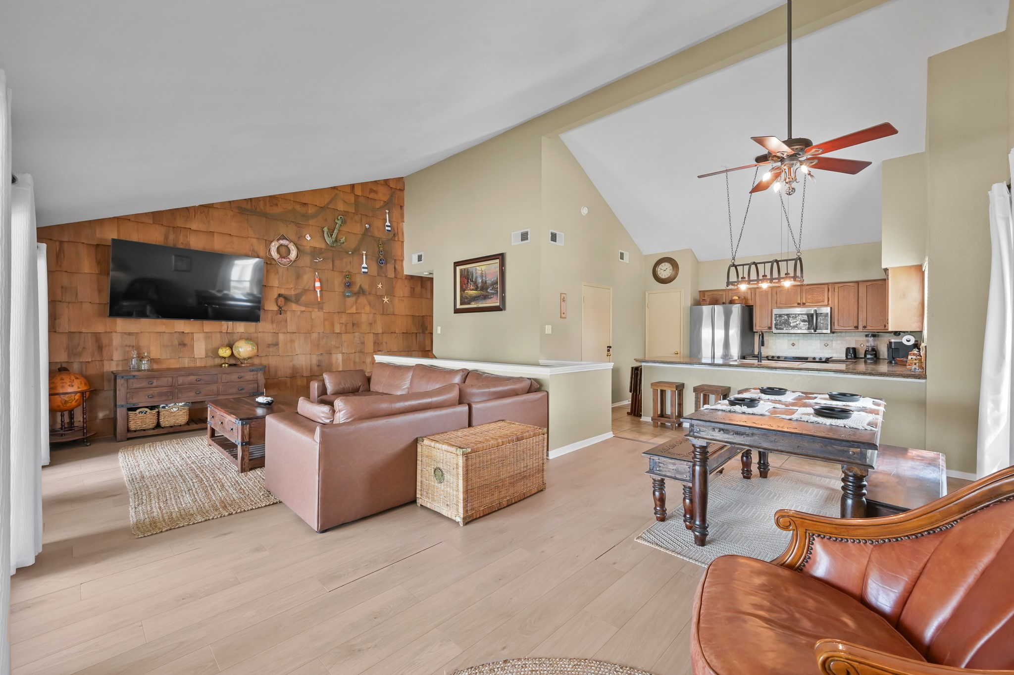 116 April Point Drive North Conroe, TX 77356 - Photo 22 of 44 a living room with furniture and a flat screen tv