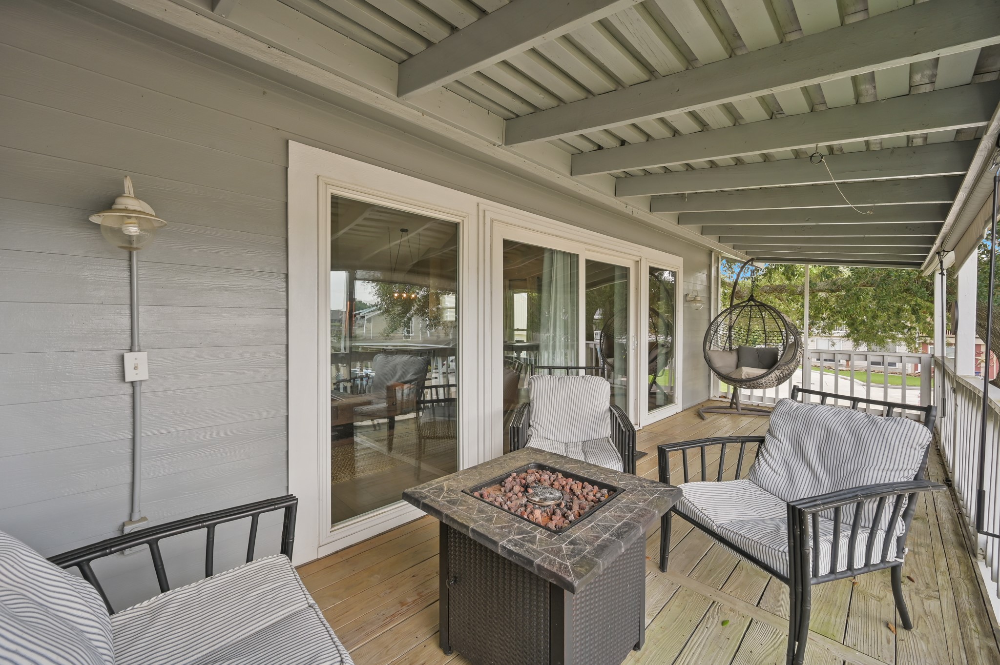 116 April Point Drive North Conroe, TX 77356 - Photo 23 of 44 a living room with furniture a window and outer view