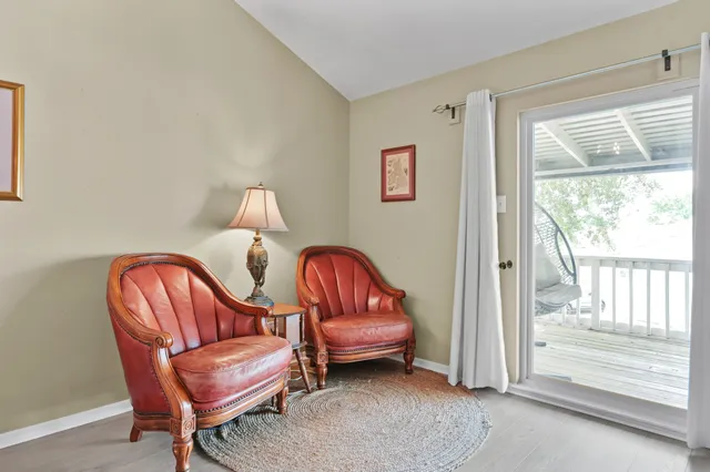 a view of living room filled with furniture