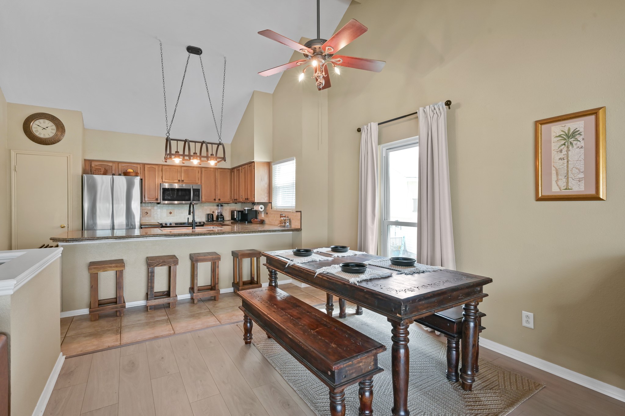 116 April Point Drive North Conroe, TX 77356 - Photo 29 of 44 a kitchen that has a table and chairs in it