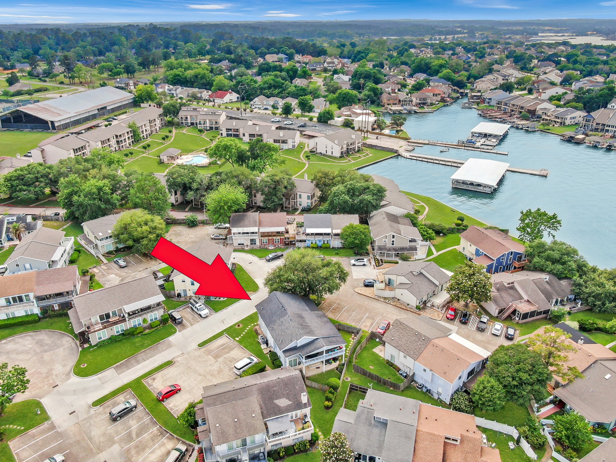 116 April Point Drive North Conroe, TX 77356 - Photo 40 of 44 an aerial view of residential houses with outdoor space