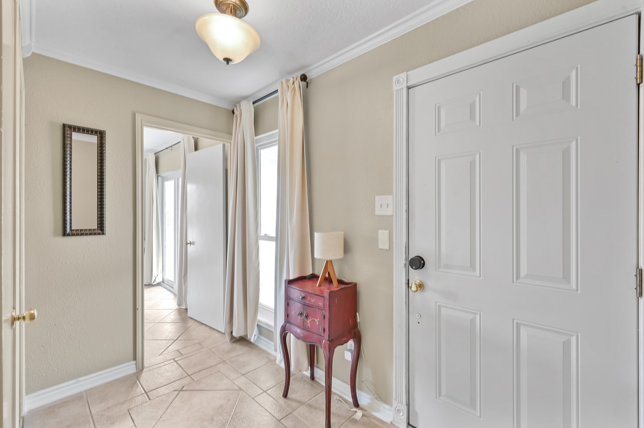 116 April Point Drive North Conroe, TX 77356 - Photo 5 of 44 a view of a hallway with bathroom