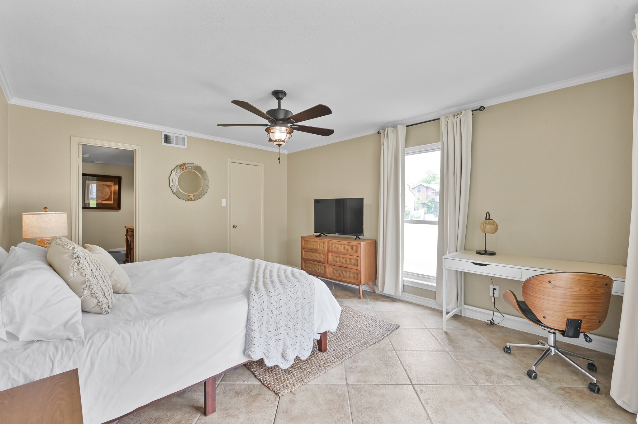 116 April Point Drive North Conroe, TX 77356 - Photo 6 of 44 a living room with a couch and a chair