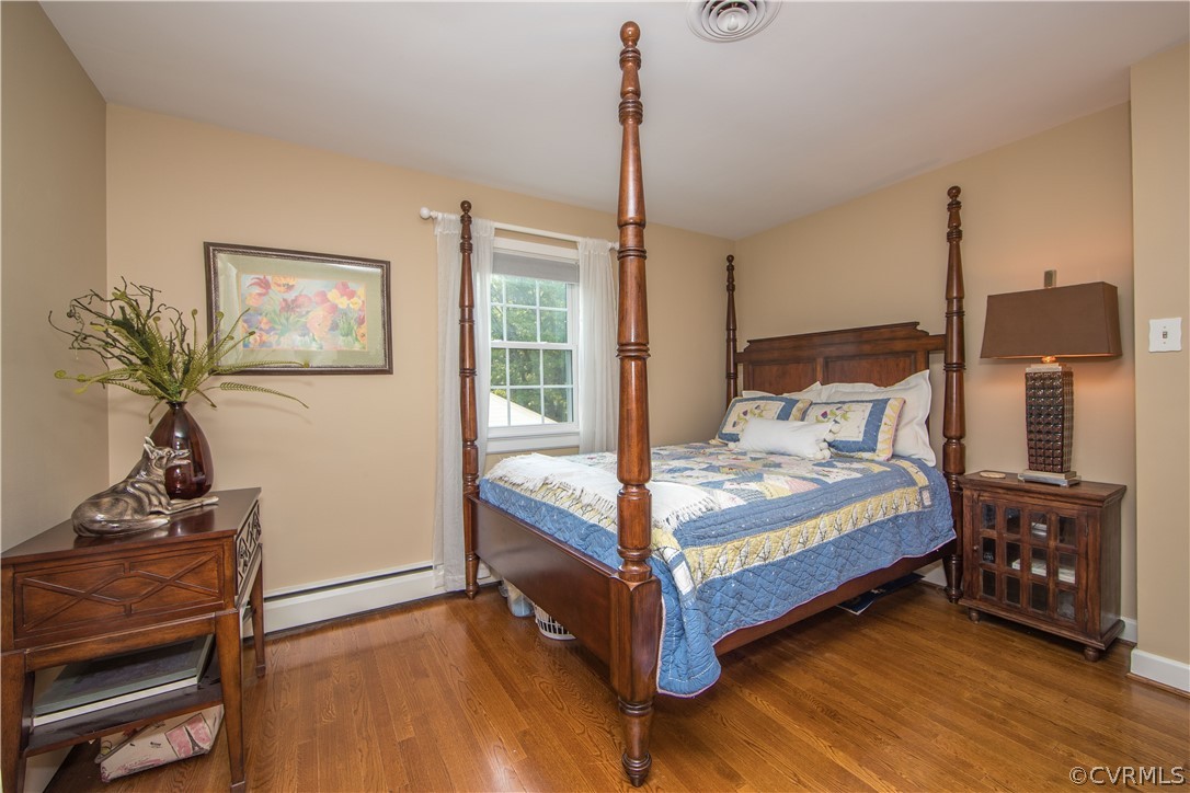 8802 Watlington Road Henrico, VA 23229 - Photo 18 of 36 Bedroom 3 features Hardwood Floors and Closet