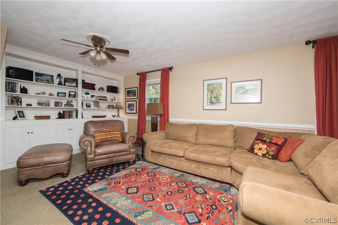 8802 Watlington Road Henrico, VA 23229 - Photo 22 of 36 Family Room with built-in bookshelves and cabinet