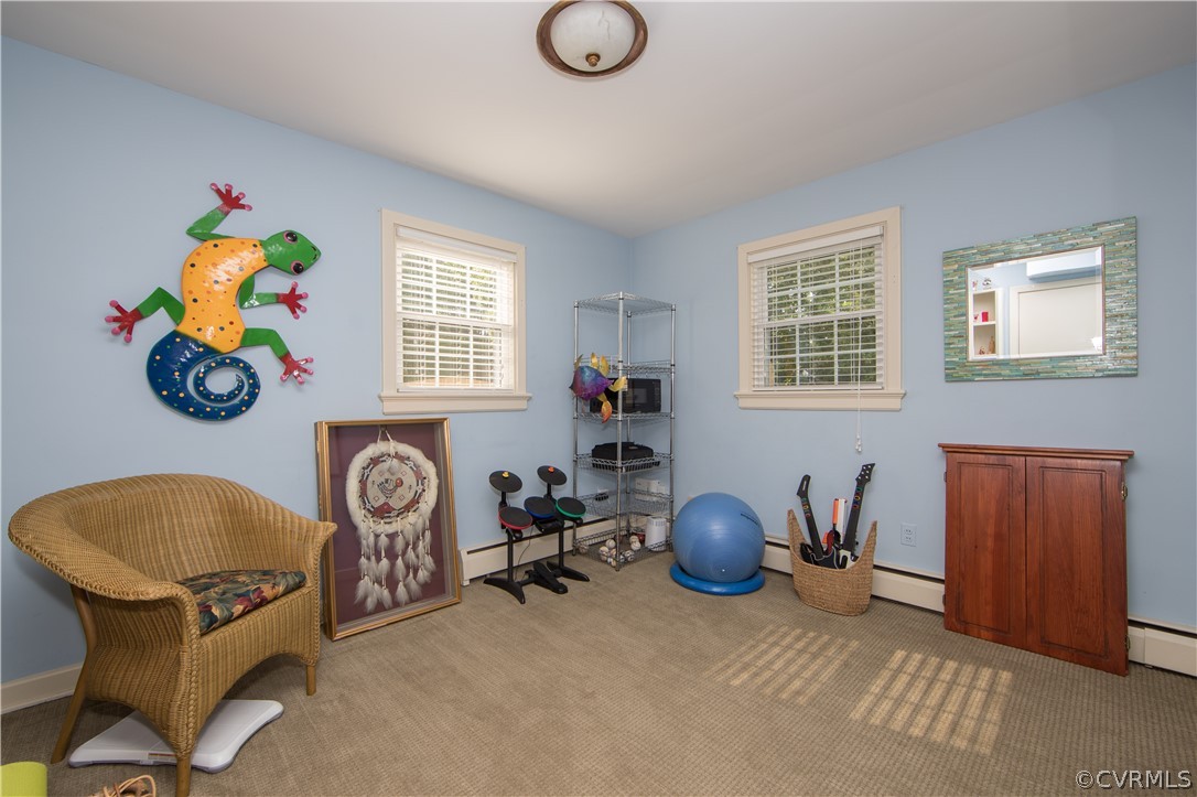 8802 Watlington Road Henrico, VA 23229 - Photo 23 of 36 Bedroom 4 features carpet, and a custom closet for