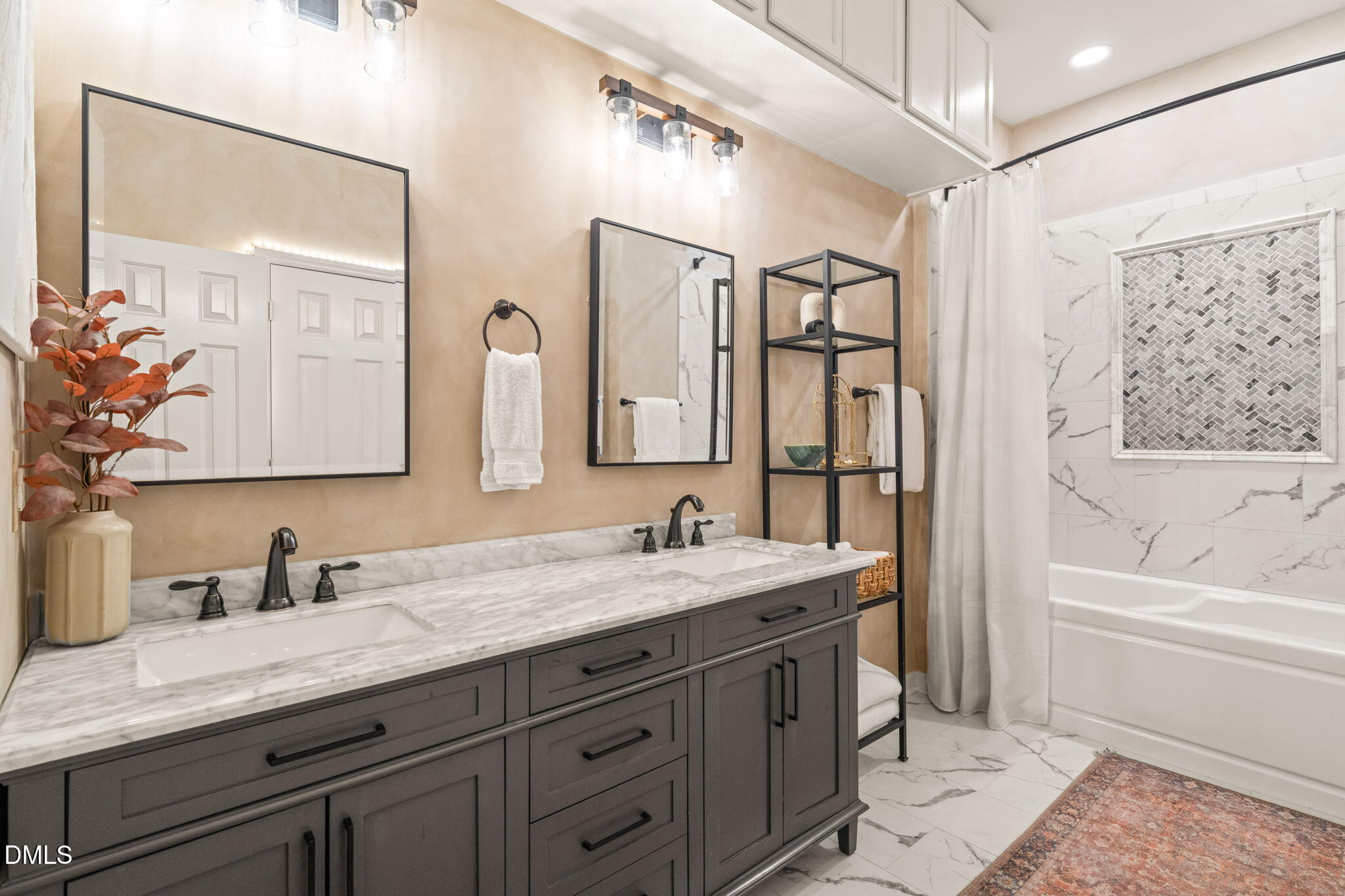 4601 Pine Trace Drive Raleigh, NC 27613 - Photo 13 of 38 a spacious bathroom with a granite countertop sink mirror and a bathtub