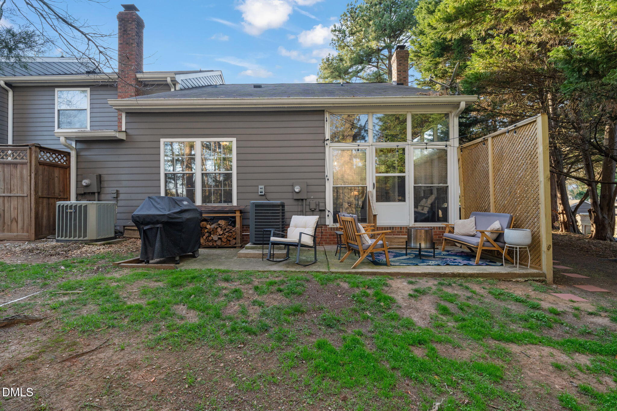4601 Pine Trace Drive Raleigh, NC 27613 - Photo 29 of 38 a view of a house with backyard sitting area and garden