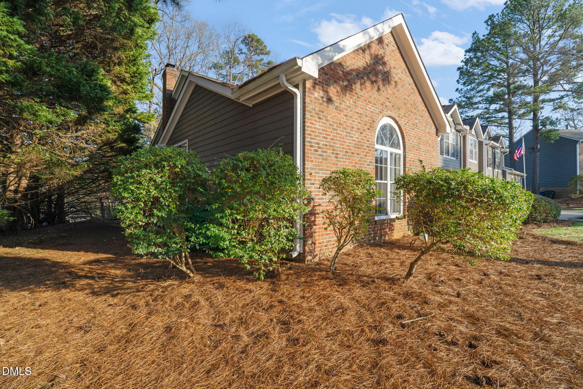 4601 Pine Trace Drive Raleigh, NC 27613 - Photo 33 of 38 a view of a house with a yard and plants