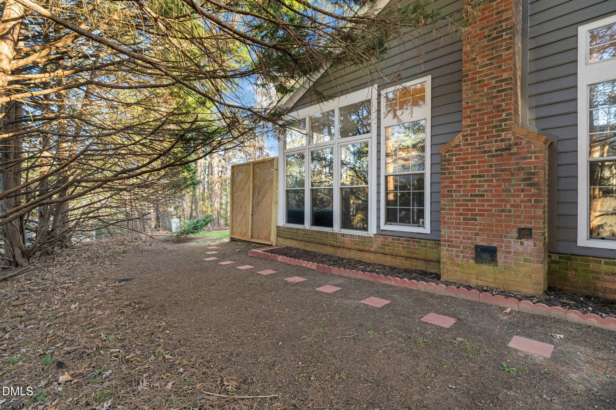 4601 Pine Trace Drive Raleigh, NC 27613 - Photo 35 of 38 a view of a house with a tree