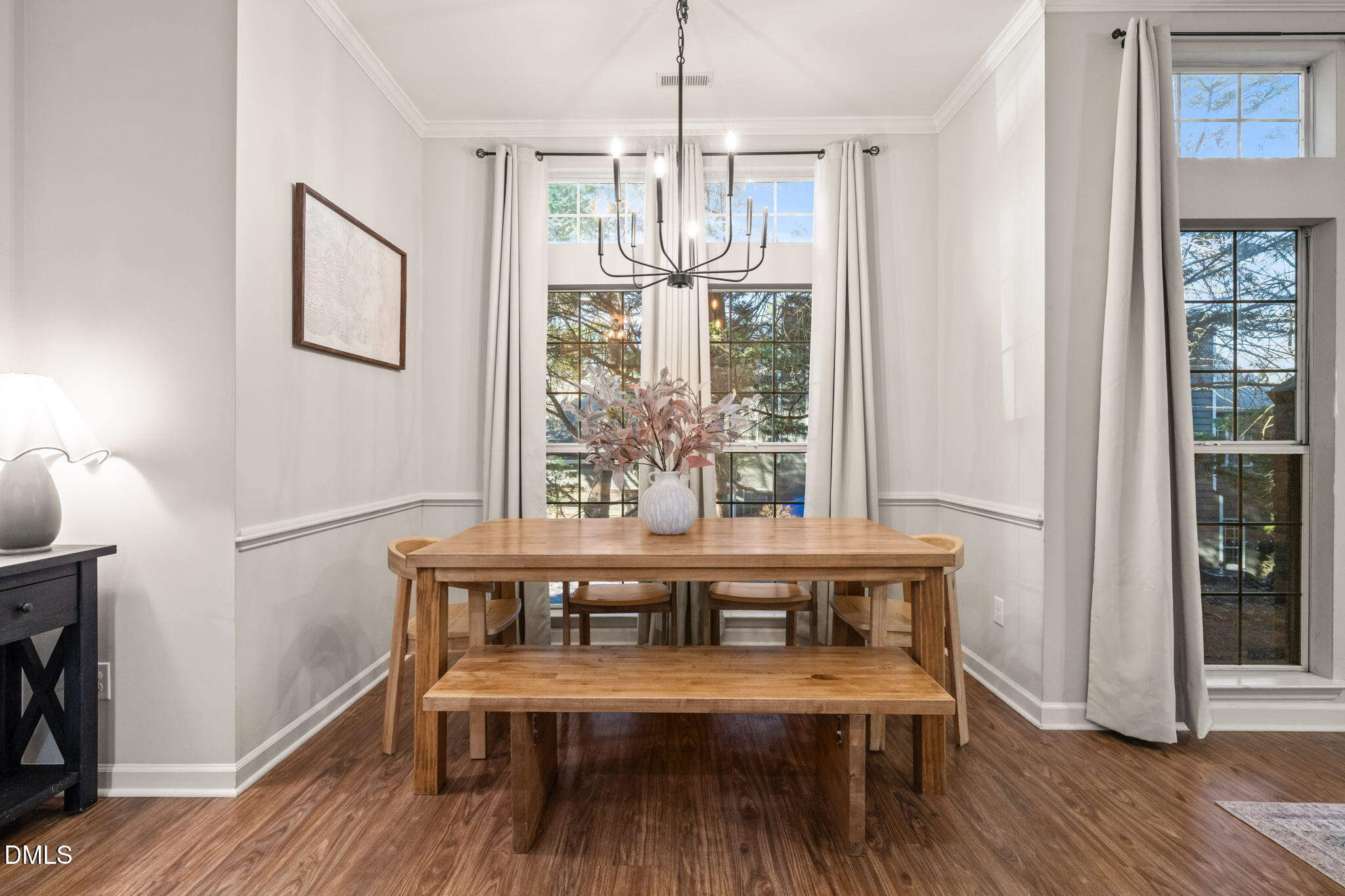 4601 Pine Trace Drive Raleigh, NC 27613 - Photo 7 of 38 a view of a room with furniture window and wooden floor