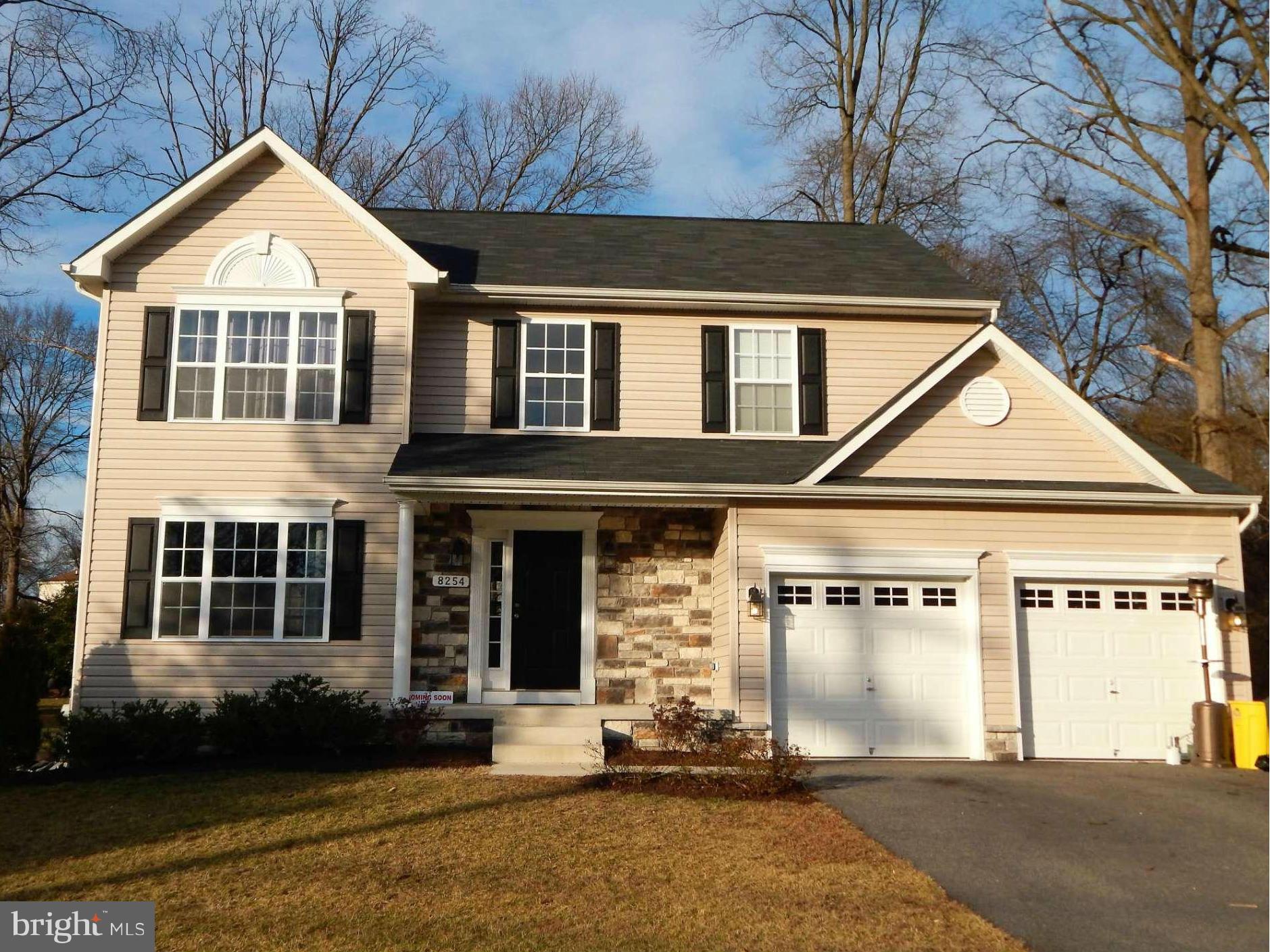 8254 Quarterfield Road Severn, MD 21144 - Photo 1 of 30 a front view of a house with a yard