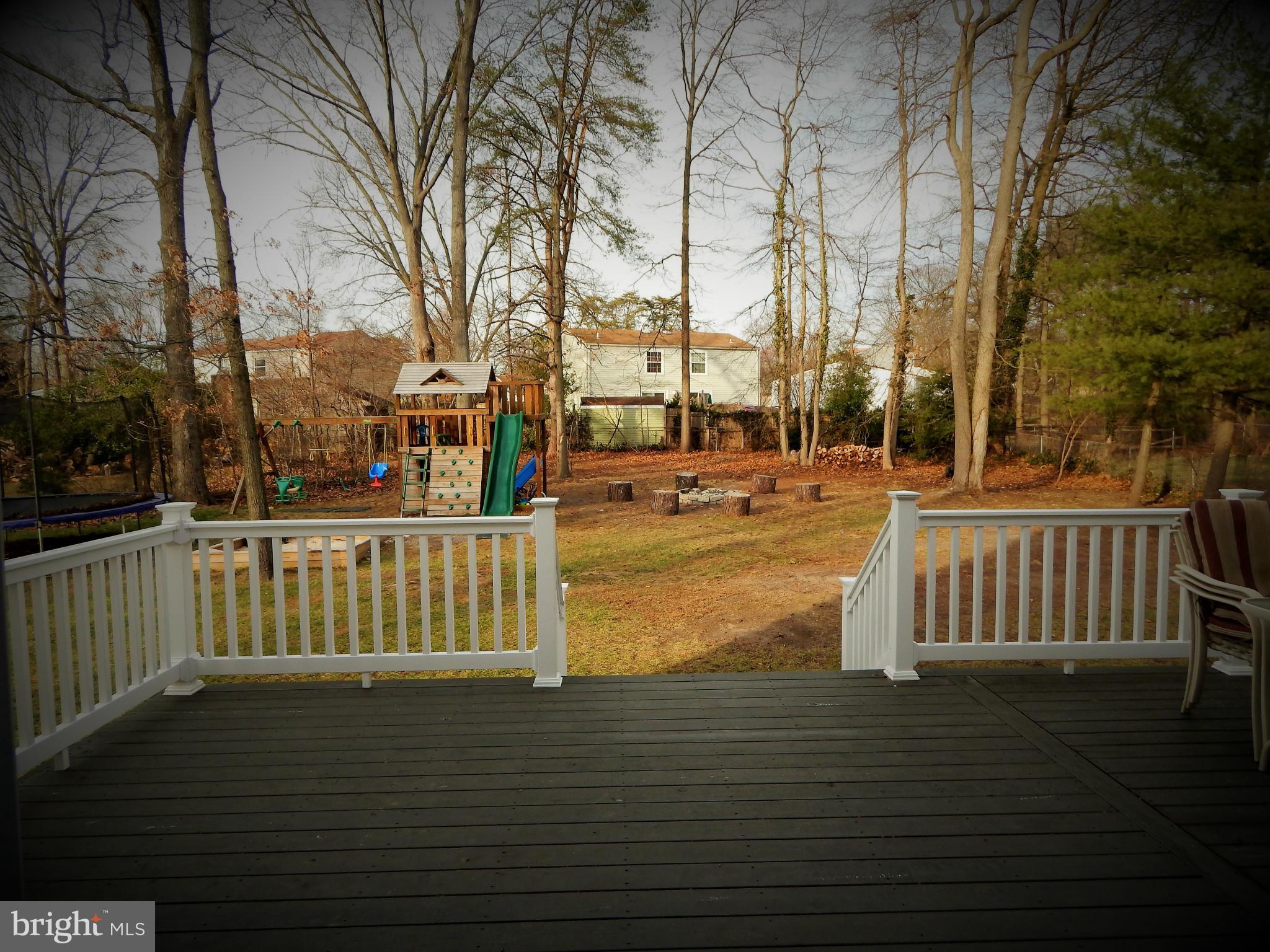 8254 Quarterfield Road Severn, MD 21144 - Photo 28 of 30 a view of balcony with wooden floor