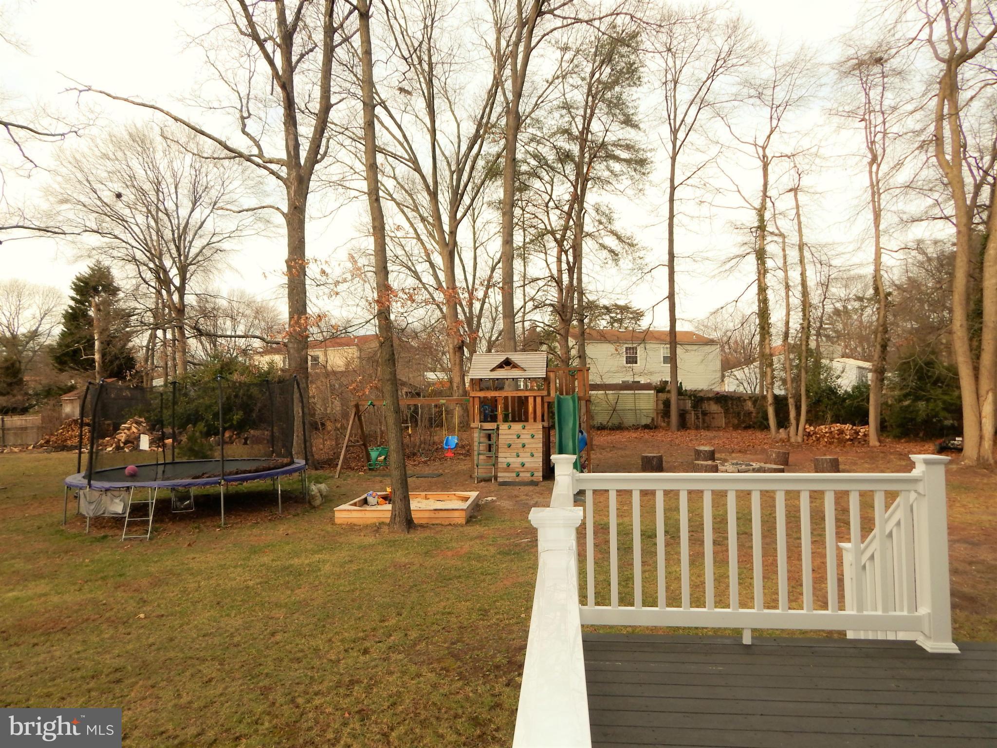 8254 Quarterfield Road Severn, MD 21144 - Photo 29 of 30 a view of a lake with trees