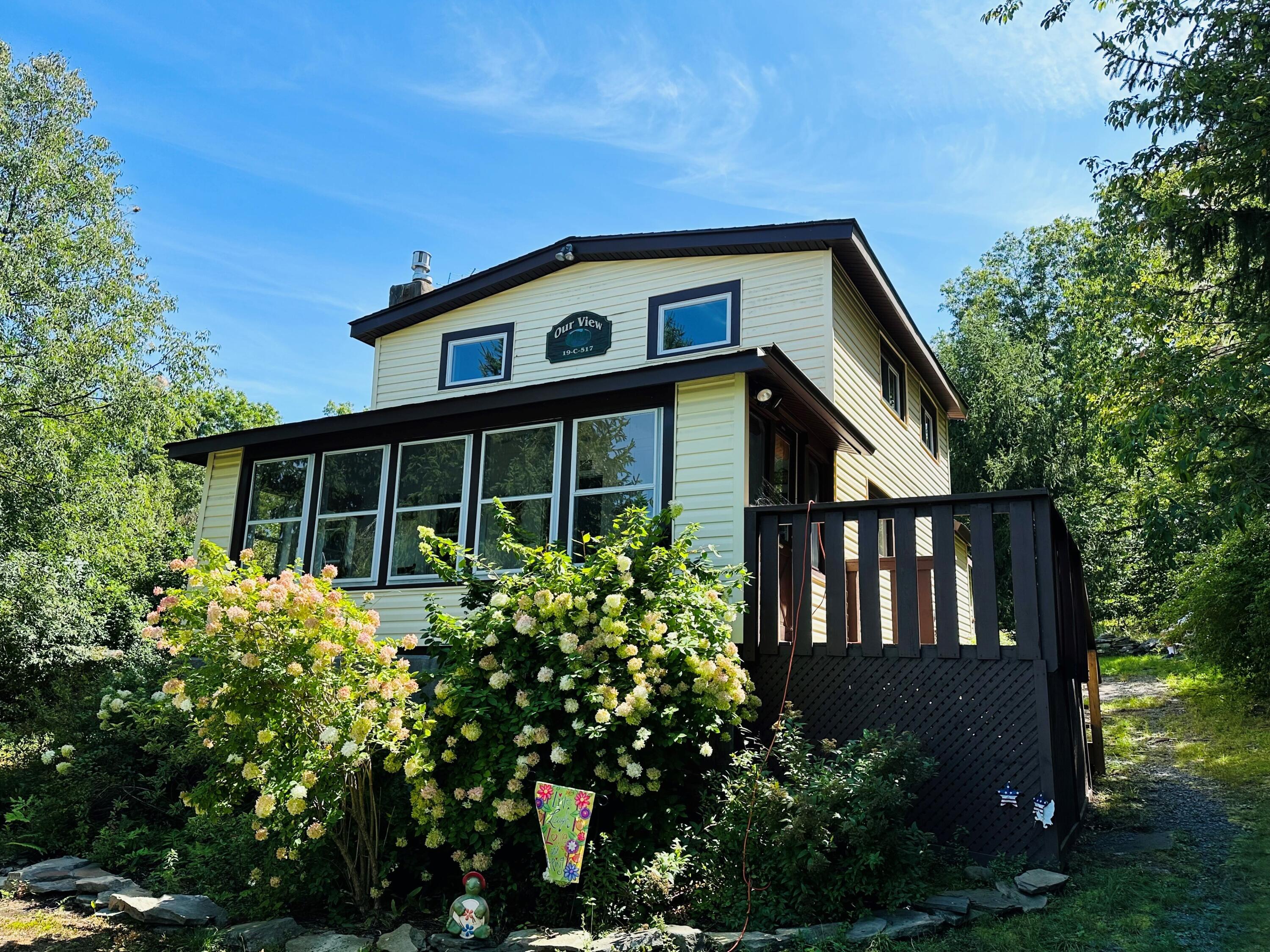 a house view with a garden space