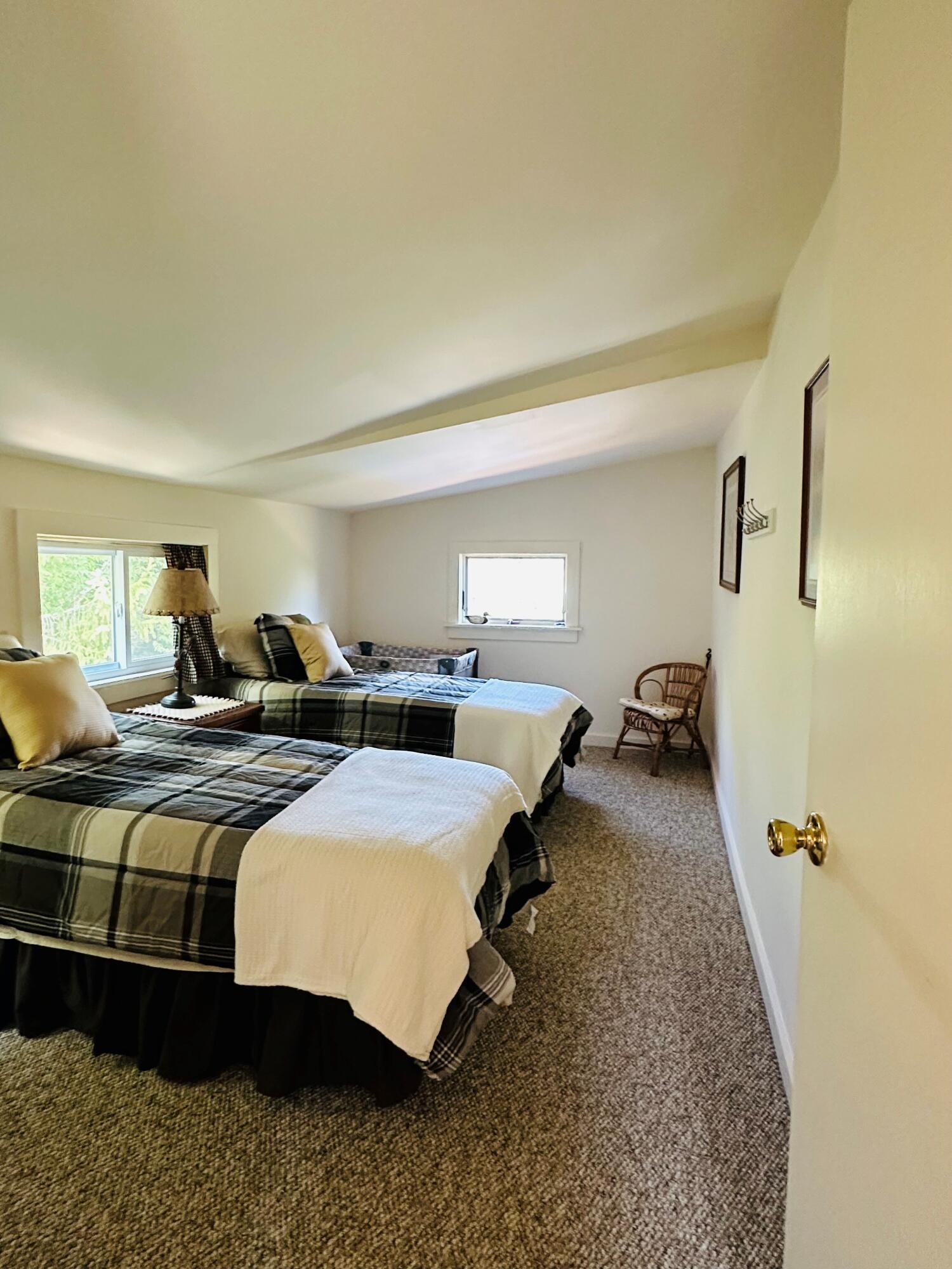 139 Pecks Pond Road Dingmans Ferry, PA 18328 - Photo 13 of 26 a bed room with two bed and a couch