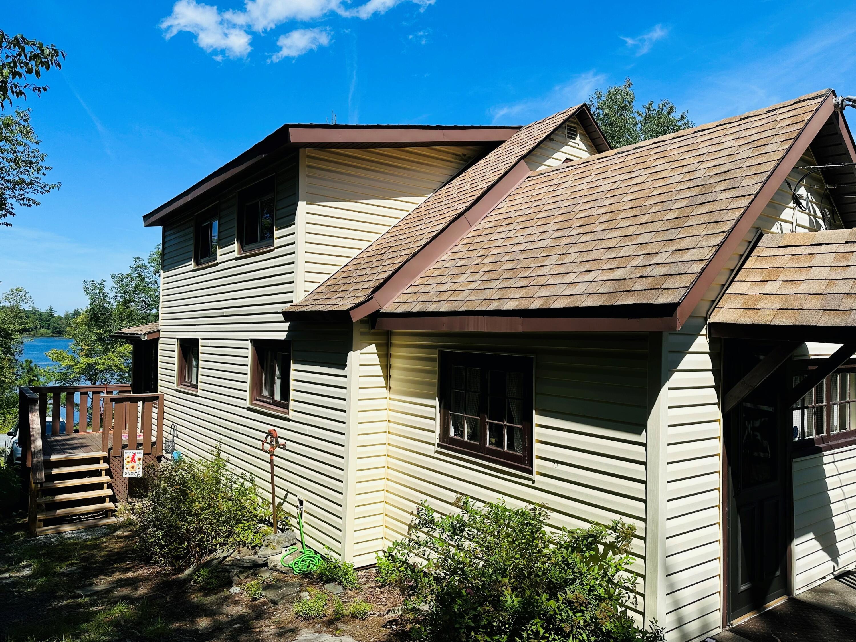 139 Pecks Pond Road Dingmans Ferry, PA 18328 - Photo 2 of 26 a view of house with patio