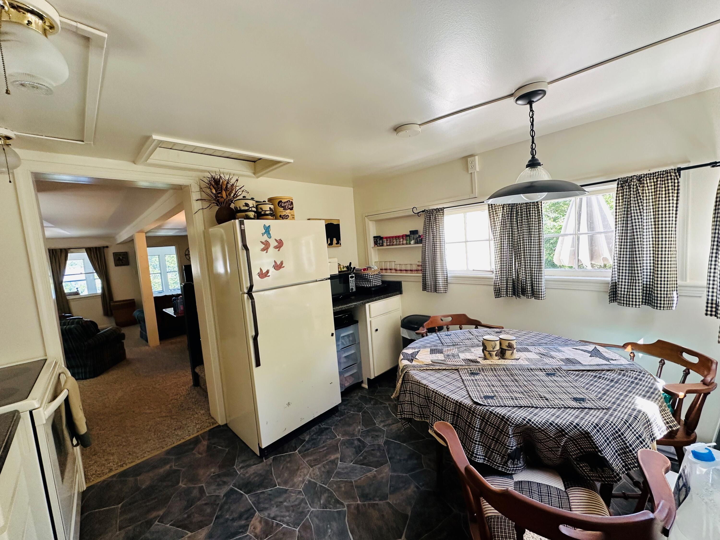 139 Pecks Pond Road Dingmans Ferry, PA 18328 - Photo 10 of 26 a bedroom with bed and white cabinets