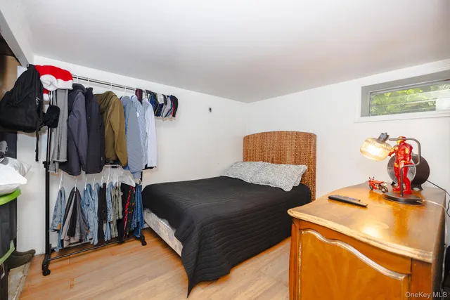 a bedroom with a bed and a closet