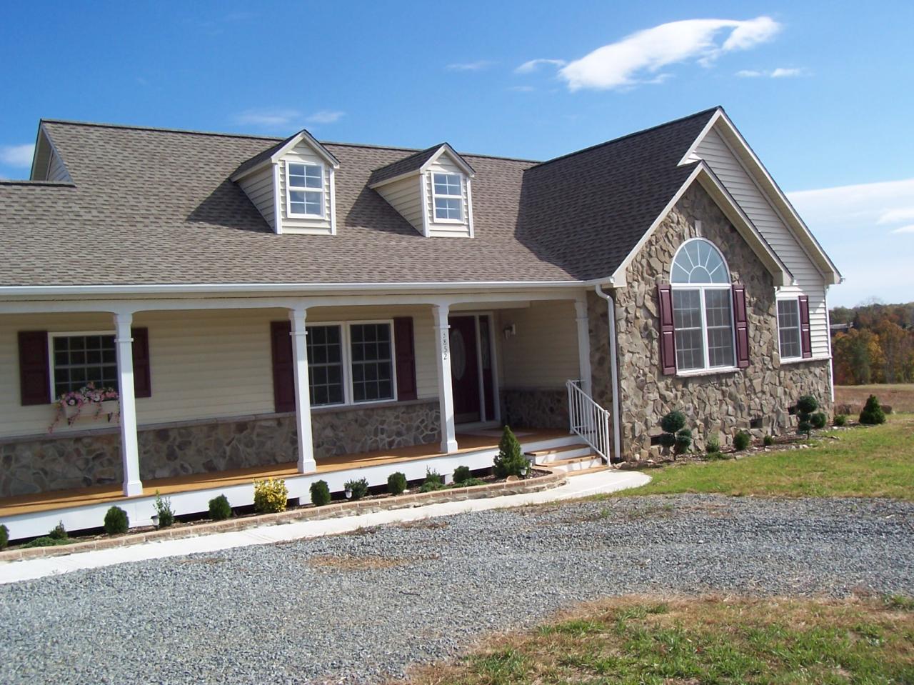 3852 Hatchett Road Penhook, VA 24137 - Photo 2 of 13 front view of a house with yard