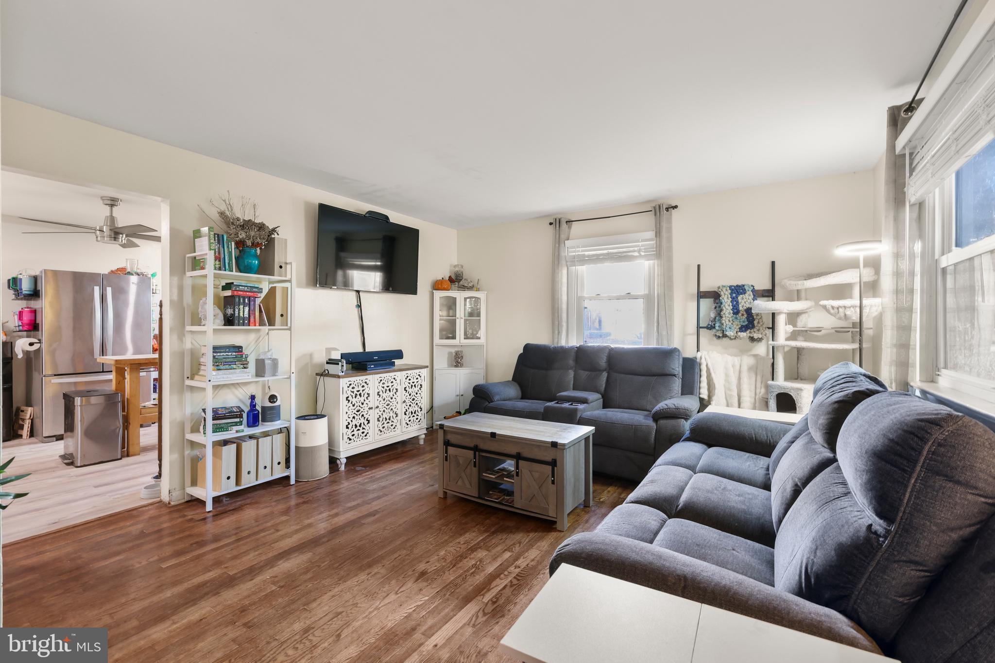 912 Arch Street Perkasie, PA 18944 - Photo 4 of 23 a living room with furniture and a flat screen tv