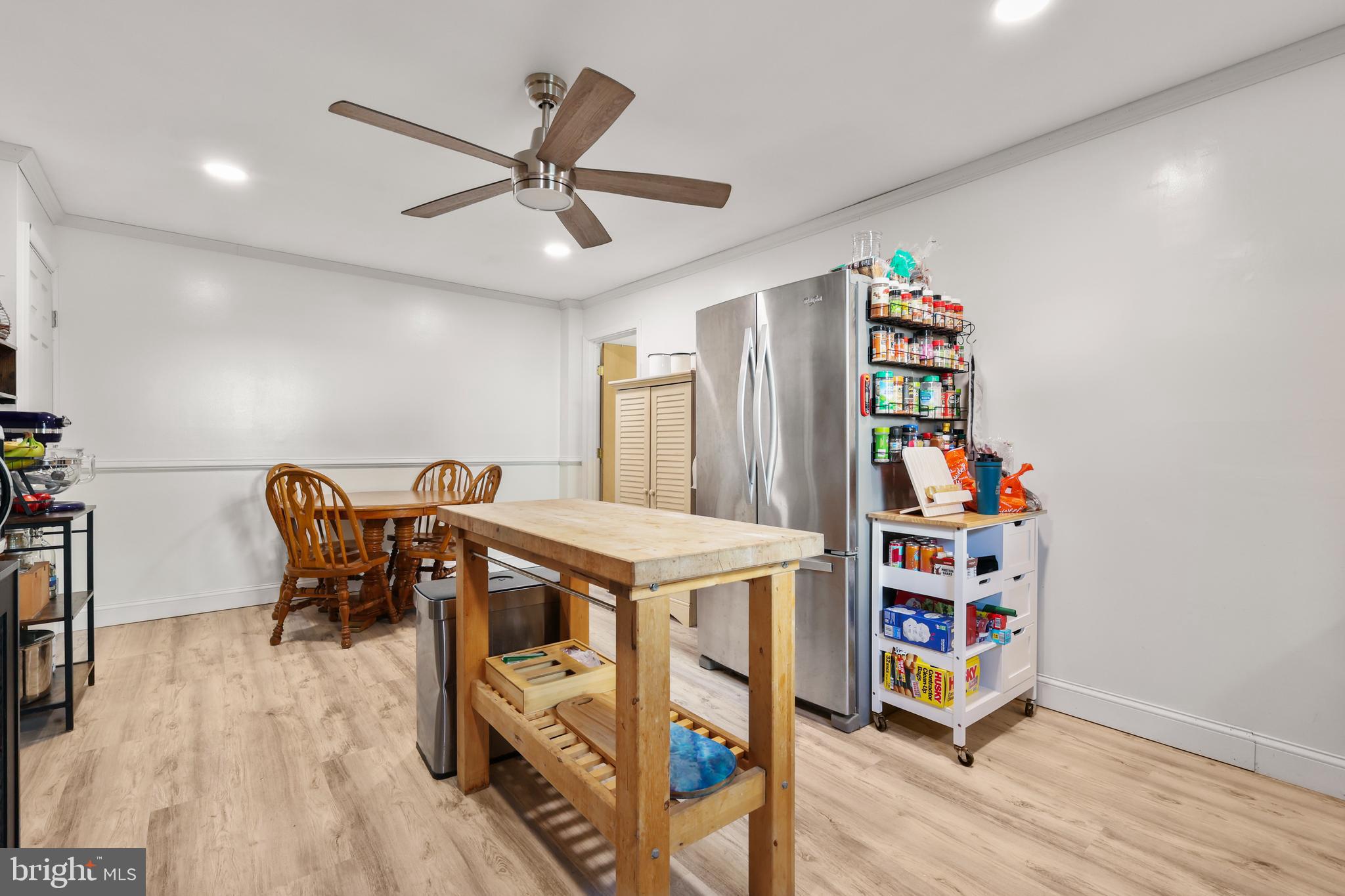 912 Arch Street Perkasie, PA 18944 - Photo 6 of 23 a dining room with furniture and a wooden floor