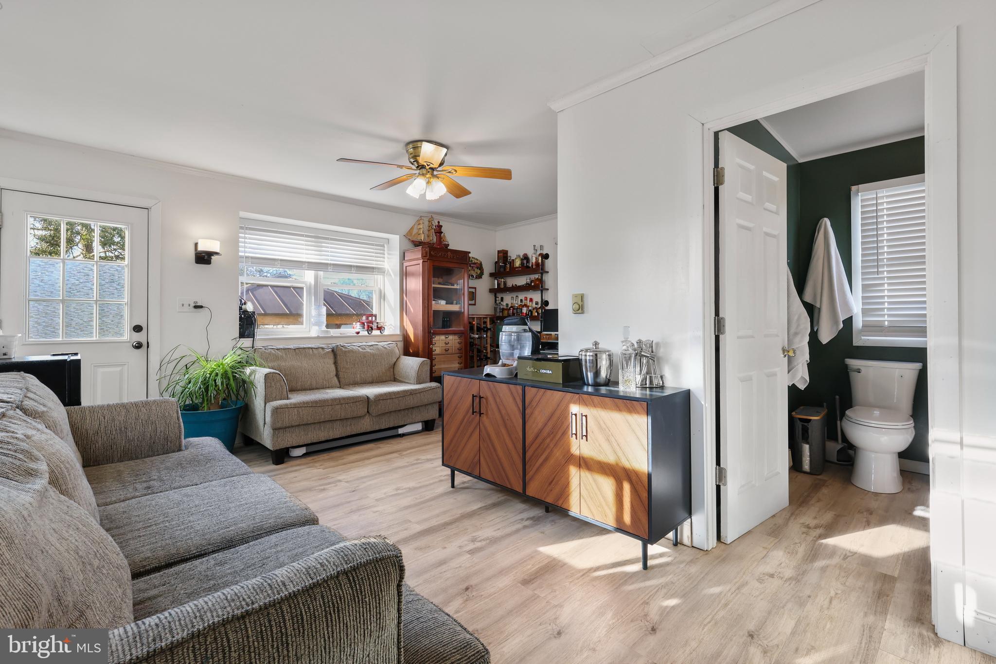 912 Arch Street Perkasie, PA 18944 - Photo 8 of 23 a living room with furniture and a view of bedroom