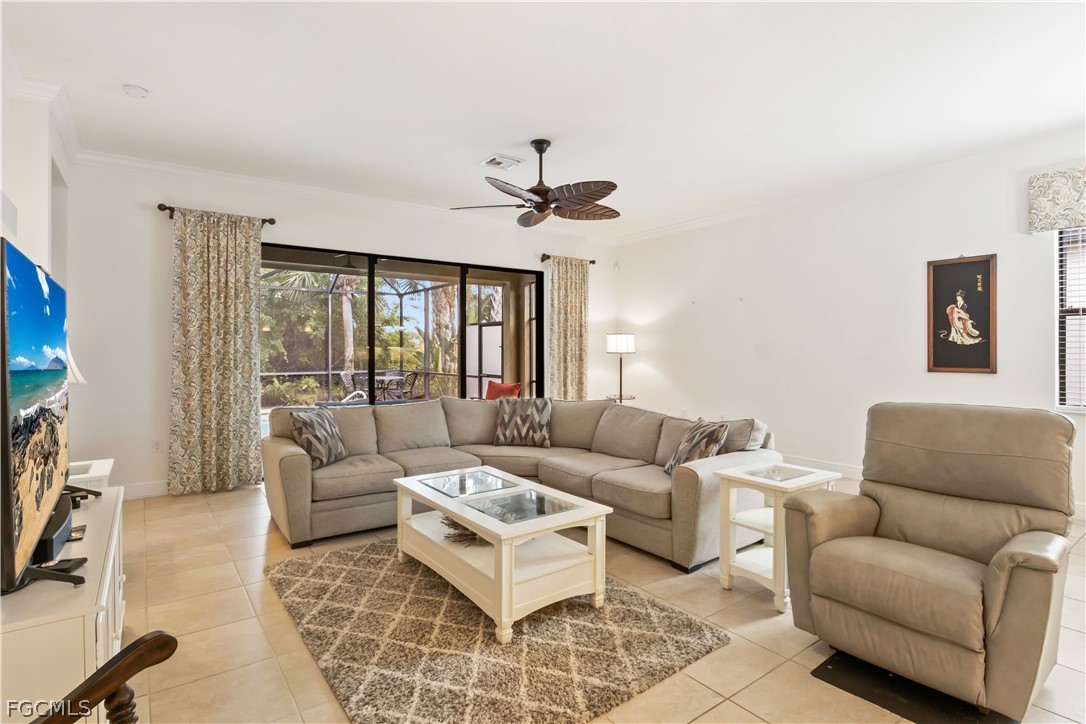 11767 Timbermarsh Court Fort Myers, FL 33913 - Photo 17 of 42 a living room with furniture a ceiling fan and a window