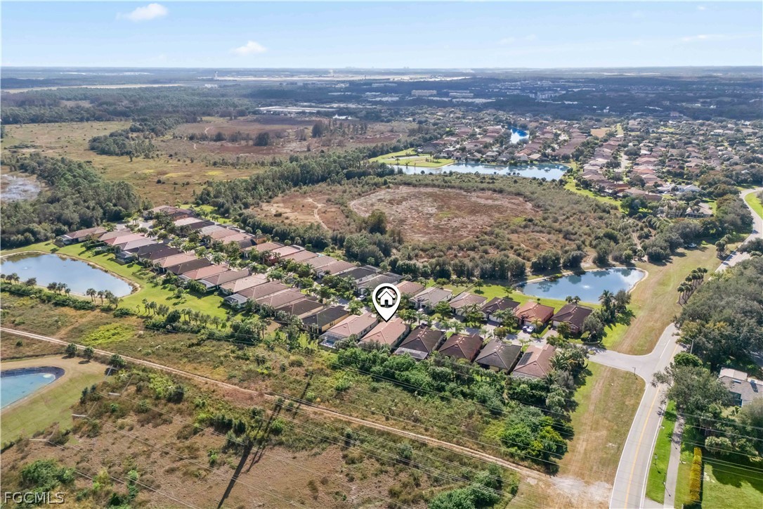11767 Timbermarsh Court Fort Myers, FL 33913 - Photo 40 of 42 an aerial view of residential houses with outdoor space