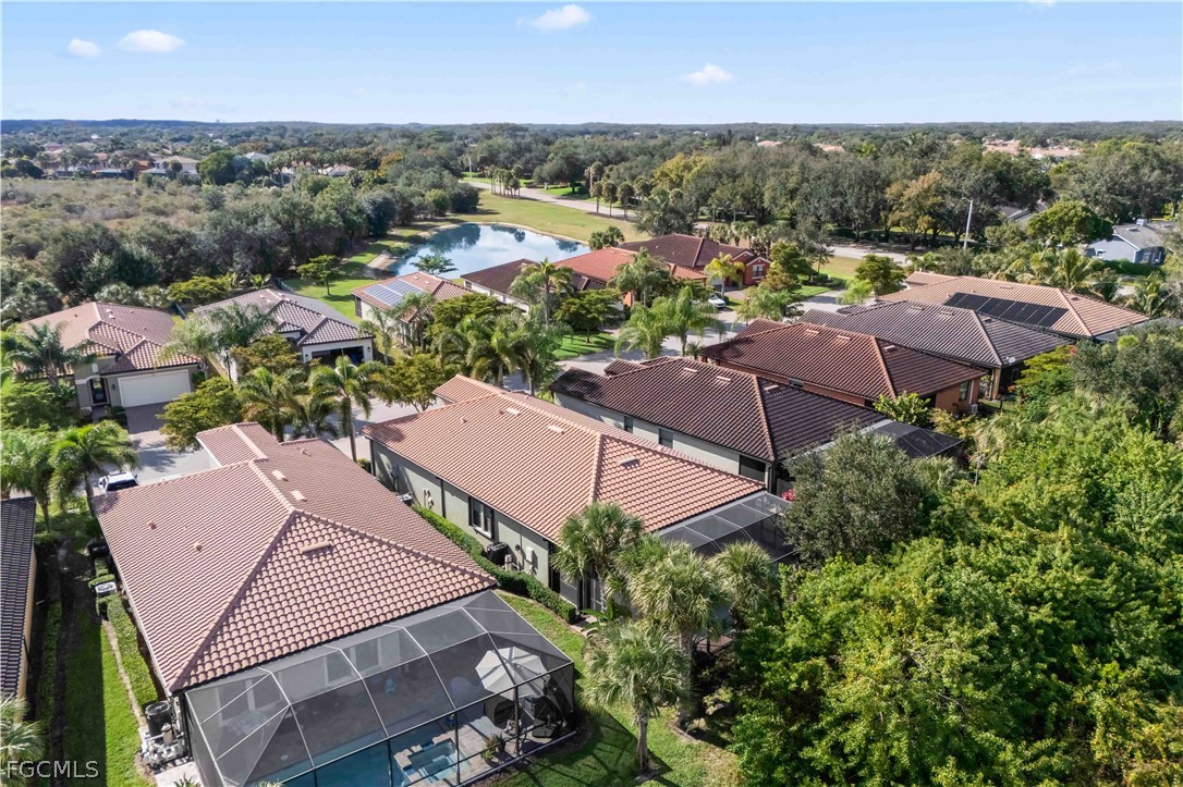 11767 Timbermarsh Court Fort Myers, FL 33913 - Photo 41 of 42 an aerial view of multiple houses with yard
