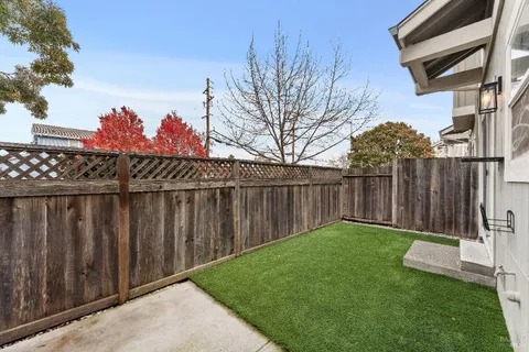 a view of a backyard with a trees