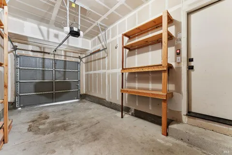 a view of an empty room with cabinet