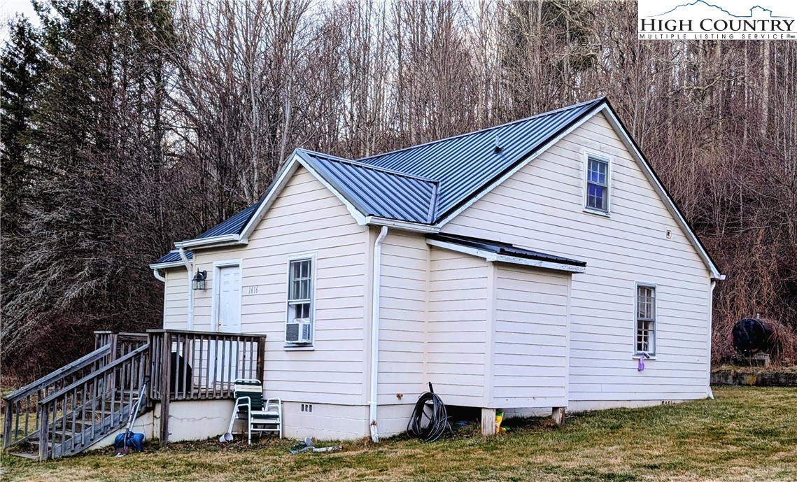 1616 Highway 194 Boone, NC 28607 - Photo 2 of 12 a front view of a house with a yard