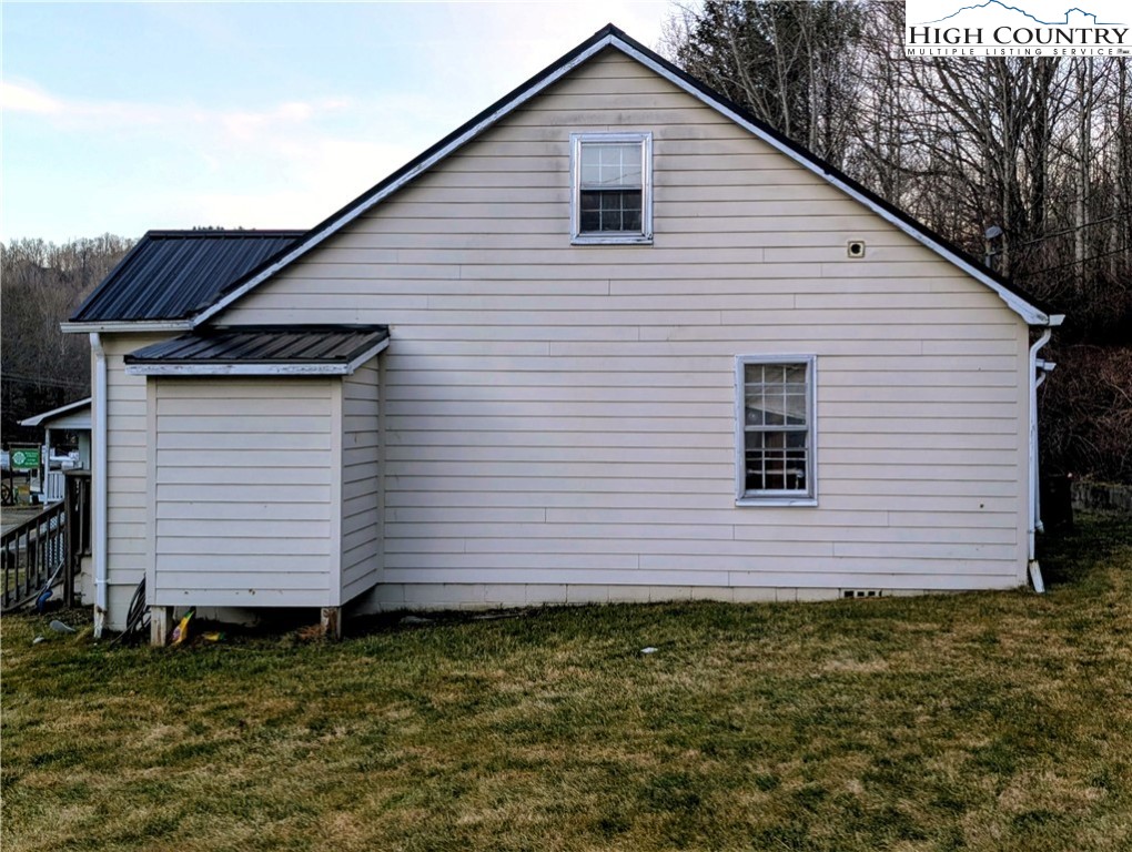 1616 Highway 194 Boone, NC 28607 - Photo 3 of 12 a view of a house with a yard