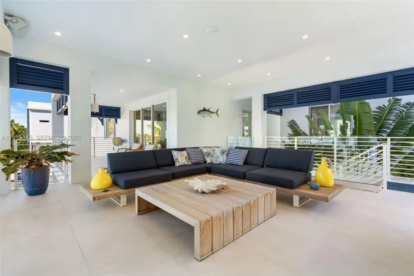 a bedroom with two beds and a window