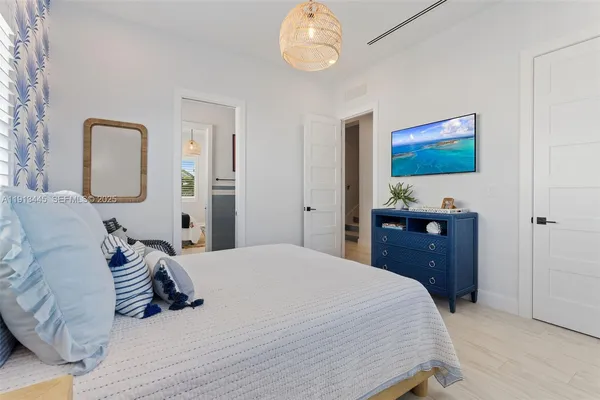 a balcony with a bench and city view