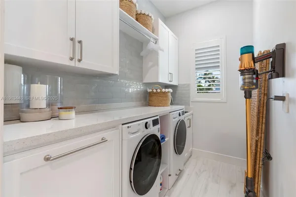an aerial view of a house with lake view