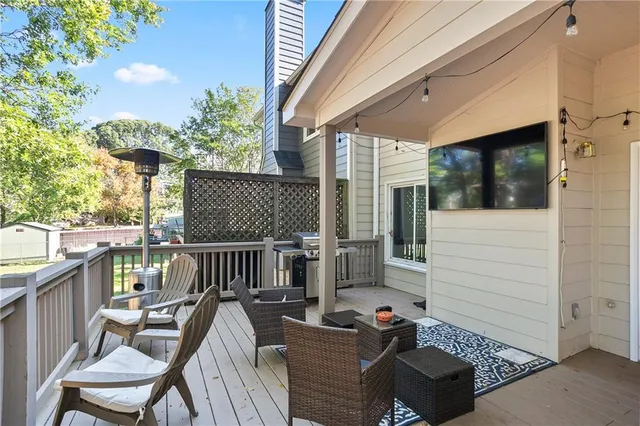 a view of a porch with furniture