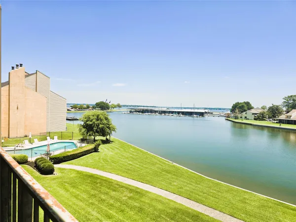 a view of a lake with couches