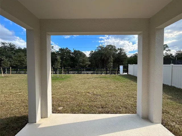 a view of outdoor space and a lake view