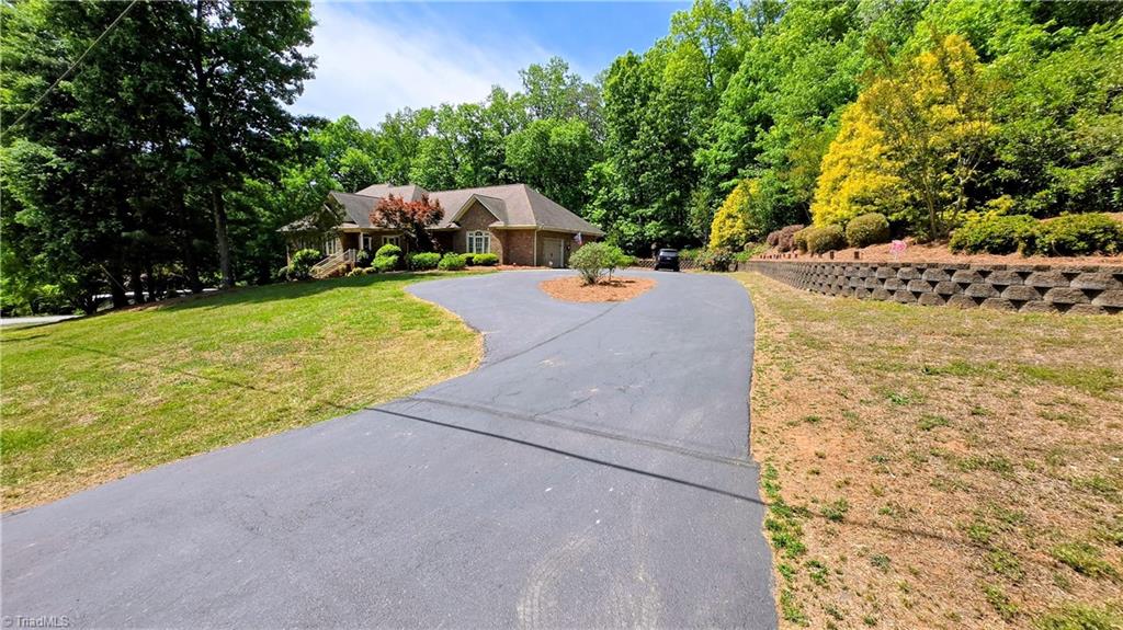 7035 Skylark Road Pfafftown, NC 27040 - Photo 36 of 47 Welcoming Circle Drive with Ample Parking for Family & Friends!