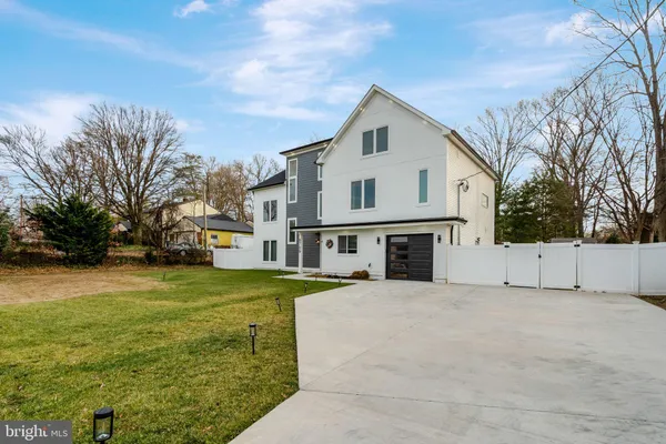 a view of house and outdoor space with yard