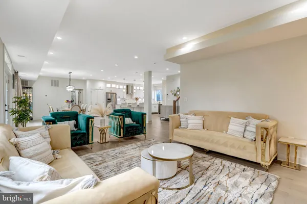a living room with furniture and a table