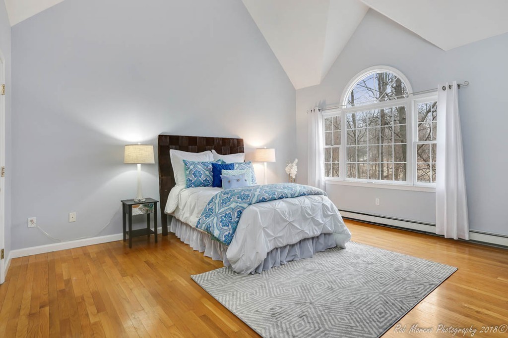 295 South Main Street Andover, MA 01810 - Photo 22 of 30 a bedroom with a bed and a window