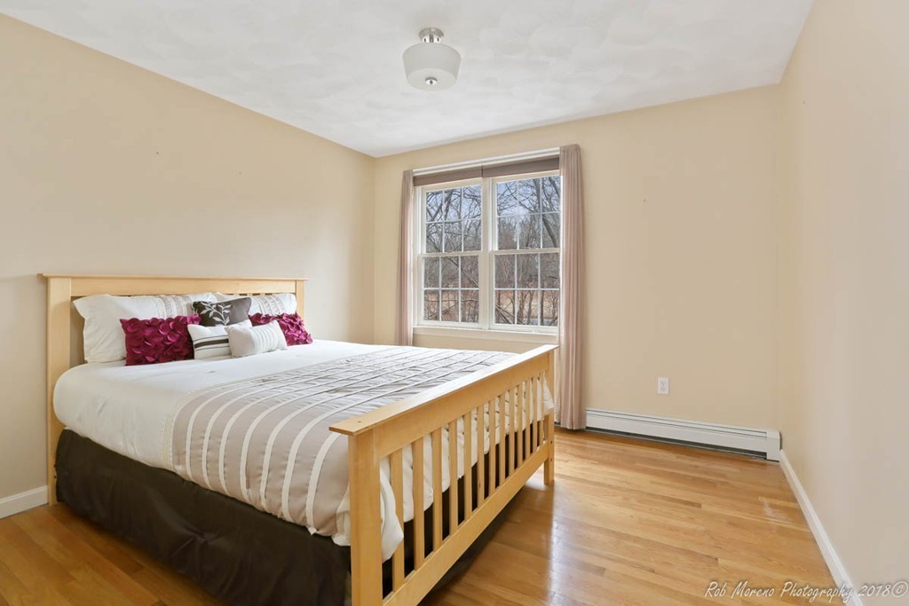 295 South Main Street Andover, MA 01810 - Photo 23 of 30 a bedroom with a bed and a window