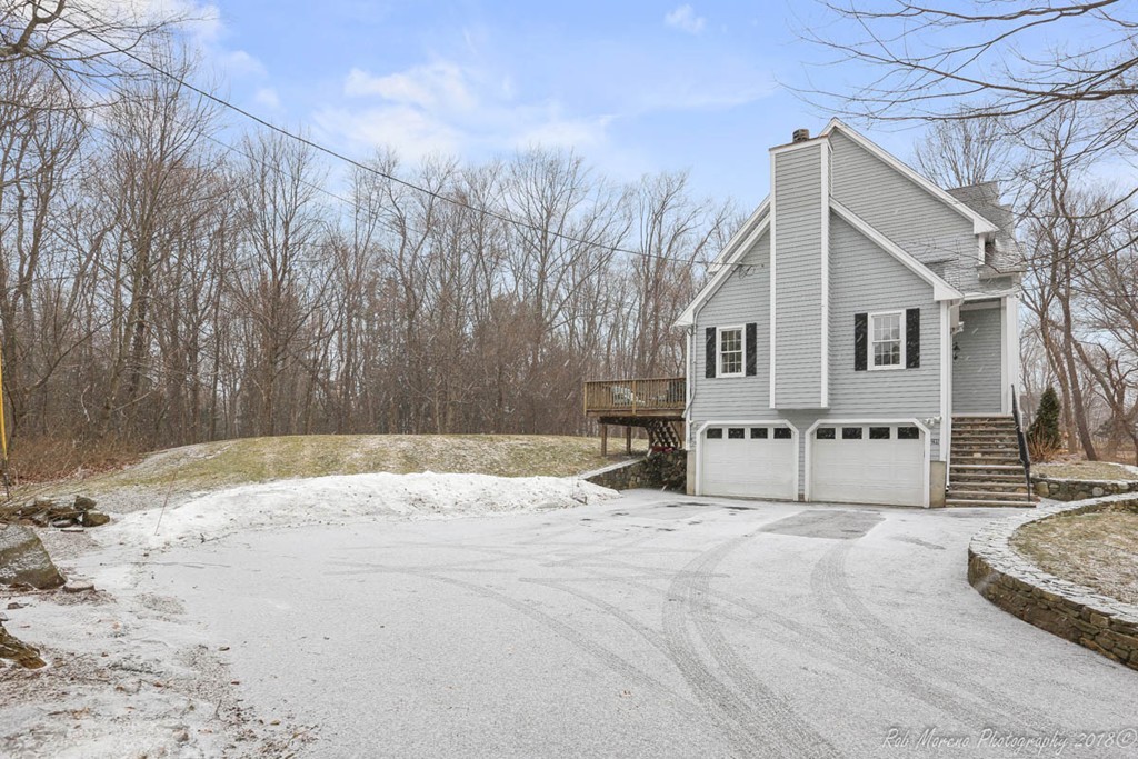 295 South Main Street Andover, MA 01810 - Photo 28 of 30 a view of a house with snow on the road
